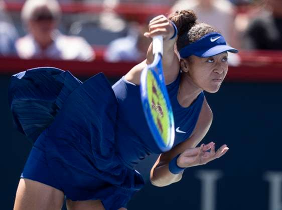 August 1, 2025, Montreal, Pq, Canada: Naomi Osaka of Japan serves to Jelena Ostapenko of Latvia during third round tennis action at the National Bank Open in Montreal, Friday, Aug. 1, 2025. Canada News - August 1, 2025  - ZUMAc35_ 20250801_zaf_c35_041 Copyright: xChristinnexMuschix