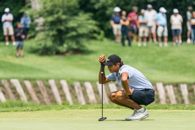 August 1, 2025, West Lafayette, Indiana, USA: CHARLIE WOODS checks the green on the final day of the PGA, Golf Herren Junior Championships on August 1, 2025, at the Birck Boilermaker Golf Complex in West Lafayette, Ind. West Lafayette USA - ZUMAw145 20250801_zsp_w145_023 Copyright: xDavidxWegielx