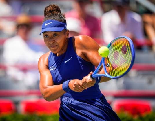 Naomi Osaka of Japan hits a shot against Jelena Ostapenko of Latvia during the National Bank Open third round at Stade IGA on August 1, 2025 in Montreal, Canada. Photo by Mathieu Belanger AFLO) Noxthirdxpartyxsales  aflo_299227745