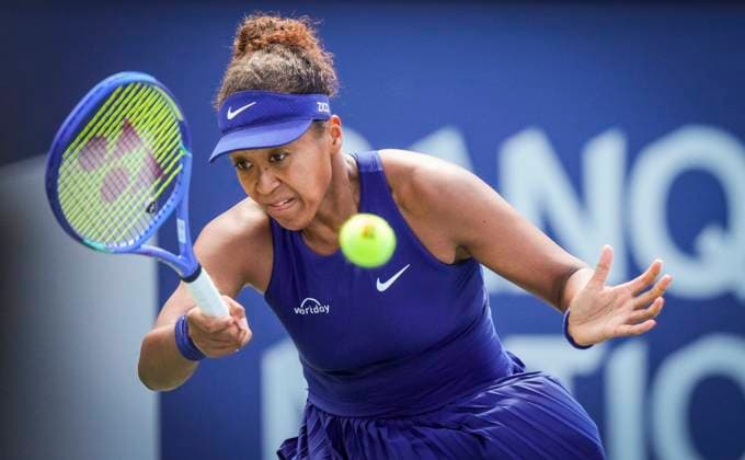 Naomi Osaka of Japan hits a shot against Jelena Ostapenko of Latvia during the National Bank Open third round at Stade IGA on August 1, 2025 in Montreal, Canada. Photo by Mathieu Belanger AFLO) Noxthirdxpartyxsales  aflo_299227790