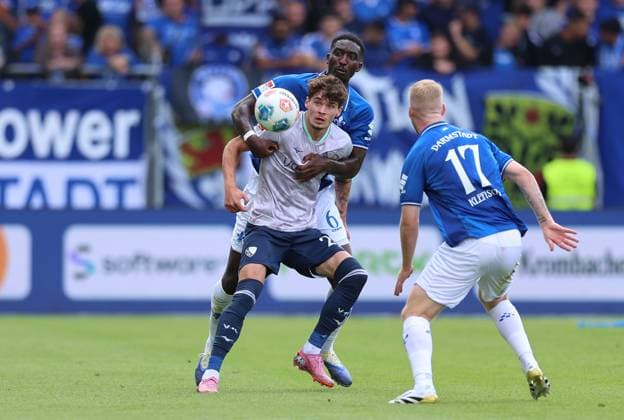 02 08 2025, xdcx, Soccer 2 Bundesliga, SV Darmstadt 98 VfL Bochum, emonline, emspor, despor, v l , Moritz Broschinski VfL Bochum , Patric Pfeiffer SV Darmstadt 98 DFL DFB REGULATIONS PROHIBIT ANY USE OF PHOTOGRAPHS AS IMAGE SEQUENCES AND OR QUASI VIDEO Copyright: HMBxMedia Claus