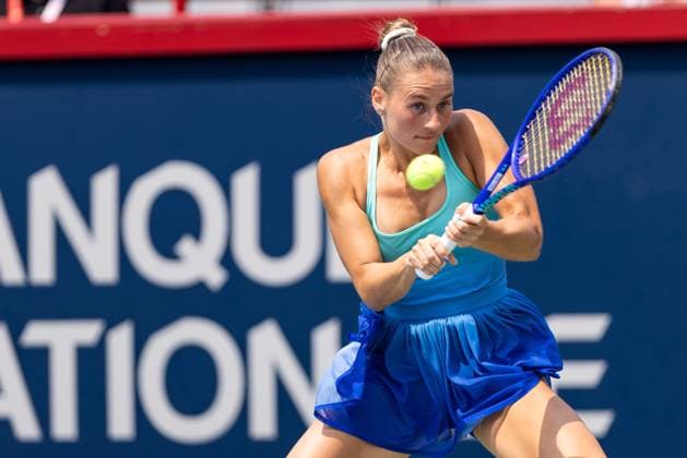 August 2, 2025, Montreal, Quebec, Canada: MARTA KOSTYUK (24) from Ukraine backhand in first set against McCartney Kessler (28) from USA in round of 16 at Canadian Open at IGA stadium in Montreal, Quebec, Canada on 2025-08-02 Montreal Canada - ZUMAl189 20250802_zsp_l189_025 Copyright: xYannickxLegarex
