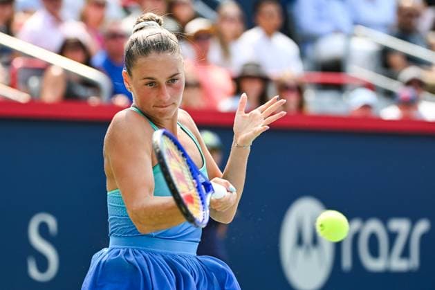 MONTREAL, QC - AUGUST 02: Marta Kostyuk (UKR) returns the ball during a fourth round match at WTA, Tennis Damen National Bank Open on August 02, 2025 at IGA Stadium in Montreal, QC (Photo by David Kirouac Icon Sportswire) TENNIS: AUG 02 National Bank Open EDITORIAL USE ONLY Icon250802008