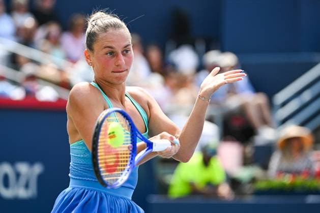 MONTREAL, QC - AUGUST 02: Marta Kostyuk (UKR) returns the ball during a fourth round match at WTA, Tennis Damen National Bank Open on August 02, 2025 at IGA Stadium in Montreal, QC (Photo by David Kirouac Icon Sportswire) TENNIS: AUG 02 National Bank Open EDITORIAL USE ONLY Icon250802009