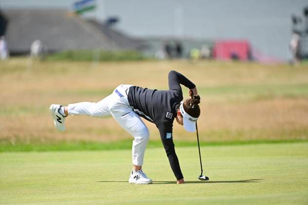 1st August 2025; Royal Porthcawl Golf Club, Porthcawl, Wales; AIG Womens Open Golf, Round 2; Miyu Yamashita retrieving her ball from the hole on 18  AledxHopkins