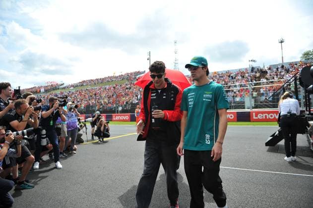 August 3, 2025, Budapest, Budapest, Hungary: Esteban Ocon, driver for Haas and Lance Stroll, driver for Aston Martin during the drivers parade before the Formula One Hungarian Grand Prix, held at the Hungaroring Budapest Hungary - ZUMAs291 20250803_zip_s291_005 Copyright: xBalintxSzentgallayx