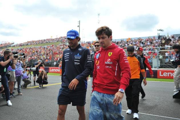 August 3, 2025, Budapest, Budapest, Hungary: Charles Leclerc, Driver for Ferrari and Carlos Sainz, Driver for Williams during the drivers parade before the Formula One Hungarian Grand Prix, held at the Hungaroring Budapest Hungary - ZUMAs291 20250803_zip_s291_012 Copyright: xBalintxSzentgallayx