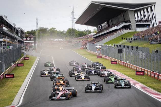 BOEDAPEST - Charles Leclerc (Ferrari) in the lead after the start, Max Verstappen (Red Bull Racing) (c) on the Hungaroring during the Hungarian Grand Prix. ANP SANDER KING xVIxANPxSportx xxANPxIVx 532748094 originalFilename: 532748094.jpg