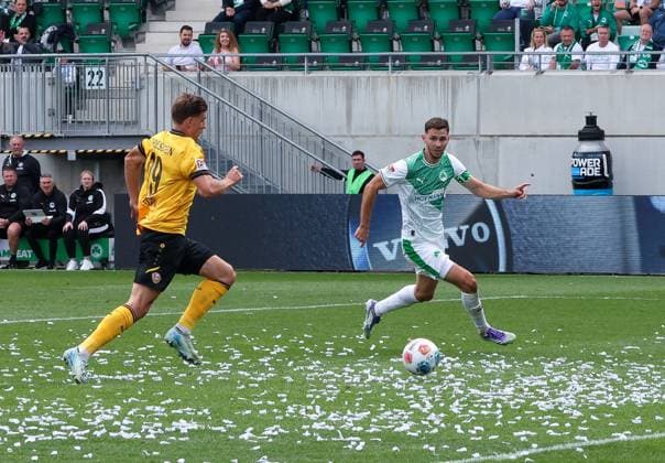 left to right Lukas Boeder 29 SG Dynamo Dresden cannot stop a chance from Branimir Hrgota 10 Spvgg Greuther Fuerth, Spvgg Greuther Fuerth vs SG Dynamo Dresden, DFL, 2 Bundesliga, Saison 2025 2026, Hinrunde, 1 Spieltag, 03 08 2025 DFB regulations prohibit any use of photographs as image sequences and or quasi video Fuerth Bayern Germany Copyright: xkolbert-press MartinxAgüerax