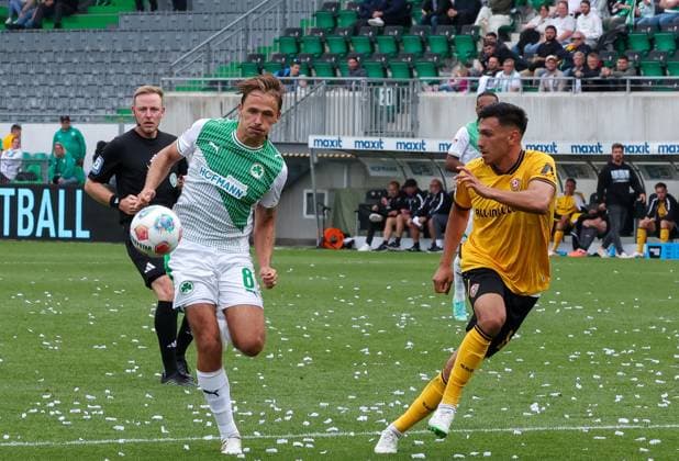 left to right Mathias Olesen 8 Spvgg Greuther Fuerth in duel with Claudio Kammerknecht 15 SG Dynamo Dresden , Spvgg Greuther Fuerth vs SG Dynamo Dresden, DFL, 2 Bundesliga, Saison 2025 2026, Hinrunde, 1 Spieltag, 03 08 2025 DFB regulations prohibit any use of photographs as image sequences and or quasi video Fuerth Bayern Germany Copyright: xkolbert-press MartinxAgüerax
