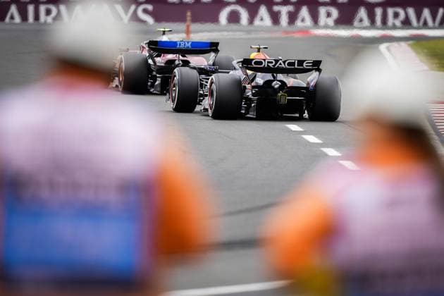 BOEDAPEST - Max Verstappen (Red Bull Racing) behind Lewis Hamilton (Ferrari) at the Hungaroring during the Hungarian Grand Prix. ANP SANDER KING xVIxANPxSportx xxANPxIVx 532750803 originalFilename: 532750803.jpg