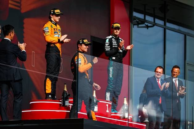 F1 - HUNGARIAN GRAND PRIX 2025 Podium: NORRIS Lando (gbr), McLaren F1 Team MCL39, PIASTRI Oscar (aus), McLaren F1 Team MCL39, RUSSELL George (gbr), Mercedes AMG F1 Team W16, portrait, during the 2025 Formula 1 Lenovo Hungarian Grand Prix, 14th round of the 2025 FIA Formula One World Championship, WM, Weltmeisterschaft from August 1 to 3, 2025 on the Hungaroring, in Mogyorod, Hungary - MogyorodHungary Copyright: xFLORENTxGOODENx