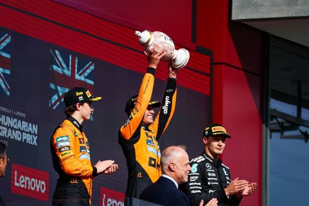 F1 - HUNGARIAN GRAND PRIX 2025 Podium: NORRIS Lando (gbr), McLaren F1 Team MCL39, PIASTRI Oscar (aus), McLaren F1 Team MCL39, RUSSELL George (gbr), Mercedes AMG F1 Team W16, portrait, during the 2025 Formula 1 Lenovo Hungarian Grand Prix, 14th round of the 2025 FIA Formula One World Championship, WM, Weltmeisterschaft from August 1 to 3, 2025 on the Hungaroring, in Mogyorod, Hungary - MogyorodHungary  Copyright: xFLORENTxGOODENx