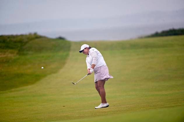 3rd August 2025; Royal Porthcawl Golf Club, Porthcawl, Wales; AIG Womens Open Golf, Final Round; Kristen Gillman chipping onto the green at 13  AledxHopkins