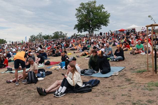 Spectators sit comfortably above turn 11 during the race in the standing area, Formula 1 Hungarian Grand Prix, Budapest, 03 08 2025, FIA, Fans, Crowd, Hungaroring