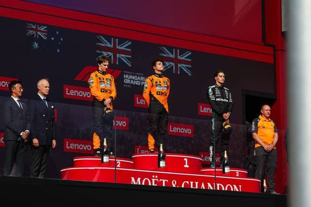 F1 - HUNGARIAN GRAND PRIX 2025 podium NORRIS Lando (gbr), McLaren F1 Team MCL39, PIASTRI Oscar (aus), McLaren F1 Team MCL39, portrait RUSSELL George (gbr), Mercedes AMG F1 Team W16, portrait during the 2025 Formula 1 Lenovo Hungarian Grand Prix, 14th round of the 2025 FIA Formula One World Championship, WM, Weltmeisterschaft from August 1 to 3, 2025 on the Hungaroring, in Mogyorod, Hungary - MogyorodHungary Copyright: xANTONINxVINCENTx