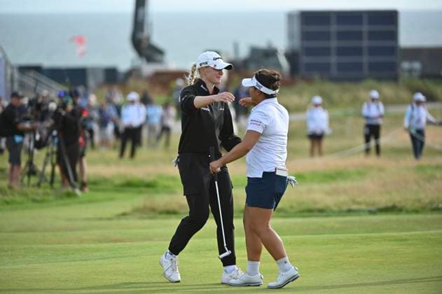 3rd August 2025; Royal Porthcawl Golf Club, Porthcawl, Wales; AIG Womens Open Golf, Final Round; Charley Hull hugs Megan Khang as they finish their round  AledxHopkins