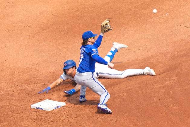 August 3, 2025, Toronto, On, CAN: Toronto Blue Jays outfielder Joey Loperfido (10) slides safely in second base in front of Kansas City Royals shortstop Bobby Witt Jr. (7) during fifth inning MLB, Baseball Herren, USA baseball action in Toronto on Sunday August 3, 2025. Joey Loperfido ; Bobby Witt Jr.  - ZUMAc35_ 20250803_zaf_c35_049 Copyright: xChrisxYoungx