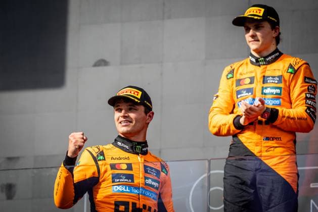F1 HUNGARIAN GRAND PRIX RACE Lando Norris of Great Britain and McLaren and Oscar Piastri of Australia and McLaren celebrate on podium after sunday s race of the F1 Grand Prix of Hungary at Hungaroring Circuit on August 03, 2025, in Budapest, Hungary. Copyright: xx 080A1787