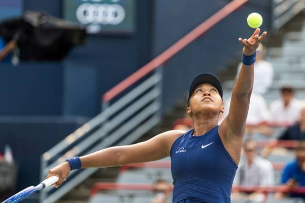 August 3, 2025, Montreal, Quebec, Canada: NAOMI OSAKA from Japan serving in first set against Anastasija Sevastova from Latvia in round of 16 at Canadian Open at IGA stadium in Montreal, Quebec, Canada on 2025-08-03 Montreal Canada - ZUMAl189 20250803_zsp_l189_052 Copyright: xYannickxLegarex