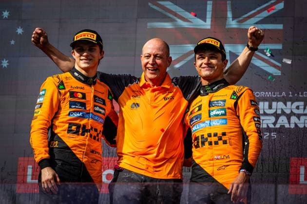 F1 HUNGARIAN GRAND PRIX RACE Lando Norris of Great Britain and McLaren and Oscar Piastri of Australia and McLaren celebrate on podium with a champagne after sunday s race of the F1 Grand Prix of Hungary at Hungaroring Circuit on August 03, 2025, in Budapest, Hungary. Copyright: xx 080A2479