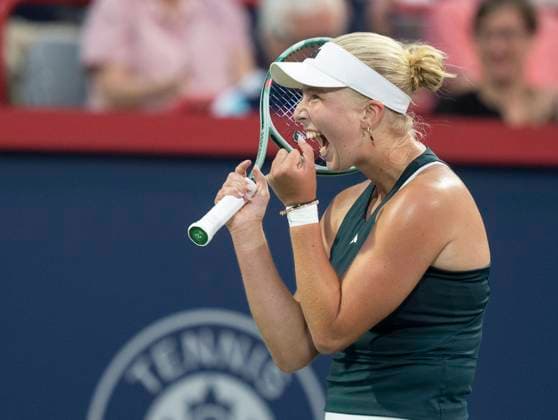 August 3, 2025, Montreal, Pq, Canada: Clara Tauson of Denmark celebrates her win over Iga Swiatek of Poland during round of 16 tennis action at the National Bank Open in Montreal, Sunday, Aug. 3, 2025. Canada News - August 3, 2025  - ZUMAc35_ 20250803_zaf_c35_175 Copyright: xChristinnexMuschix