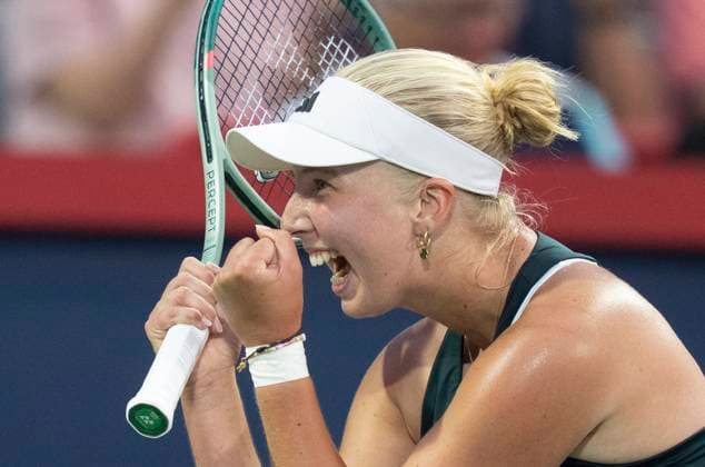 August 3, 2025, Montreal, Pq, Canada: Clara Tauson of Denmark celebrates her win over Iga Swiatek of Poland during round of 16 tennis action at the National Bank Open in Montreal, Sunday, Aug. 3, 2025. Canada News - August 3, 2025  - ZUMAc35_ 20250803_zaf_c35_176 Copyright: xChristinnexMuschix