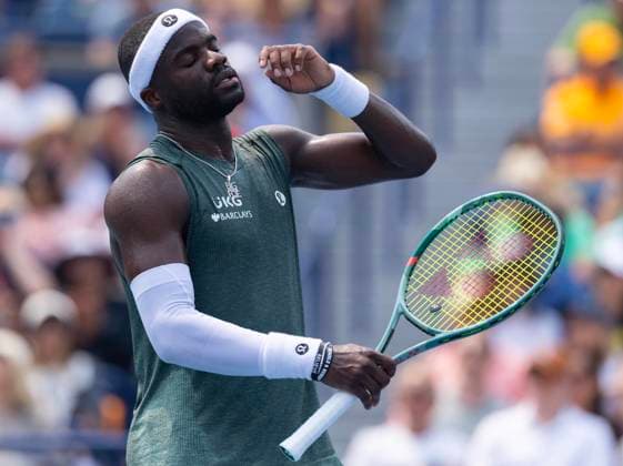 (250804) -- TORONTO, Aug. 4, 2025 -- Frances Tiafoe of the United States reacts during the men s singles round of 16 match between Frances Tiafoe of the United States and Alex De Minaur of Australia at the 2025 National Bank Open tennis tournament in Toronto, Canada, on Aug. 3, 2025. (Photo by Zou Zheng Xinhua) (SP)CANADA-TORONTO-TENNIS-NATIONAL BANK OPEN-MEN S SINGLES LinxWei 