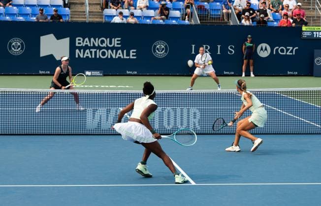 (250804) -- MONTREAL, Aug. 4, 2025 -- Barbora Krejcikova Jelena Ostapenko compete against Coco Gauff McCartney Kessler during the women s doubles quarter-final match between Coco Gauff McCartney Kessler of the United States and Barbora Krejcikova (Czech Republic) Jelena Ostapenko (Latvia) at the 2025 National Bank Open tennis tournament in Montreal, Canada, Aug 3, 2025. (Photo by Xinhua) (SP)CANADA-MONTREAL-TENNIS-NATIONAL BANK OPEN-WOMEN S DOUBLES LixHaitao 