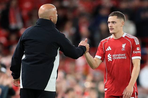 4th August 2025; Anfield, Liverpool, Merseyside, England; Pre Season Football Friendly, Liverpool versus Athletic Club; Florian Wirtz of Liverpool shakes hands with manager Arne Slot after he is substituted  DavidxBlunsden