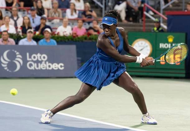 August 4, 2025, Montreal, Pq, Canada: Victoria Mboko of Canada hits a return to Jessica Bouzas Maneiro of Spain during quarterfinal tennis action at the National Bank Open in Montreal, Monday, Aug. 4, 2025. Canada News - August 4, 2025  - ZUMAc35_ 20250804_zaf_c35_063 Copyright: xChristinnexMuschix