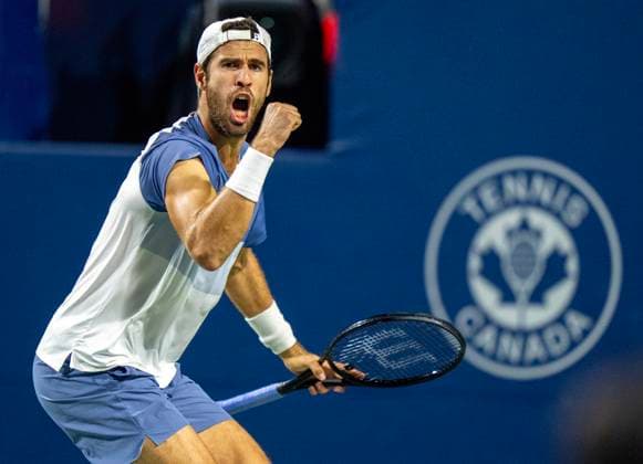 August 4, 2025, Toronto, On, Canada: Karen Khachanov of Russia celebrates on his way to defeating Alex Michelsen of the USA in their quarterfinal match at the National Bank Open in Toronto, Monday, Aug. 4, 2025. Canada News - August 4, 2025  - ZUMAc35_ 20250804_zaf_c35_105 Copyright: xFrankxGunnx