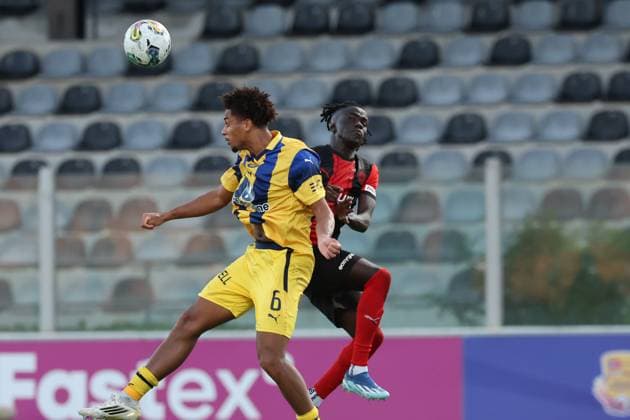 Tyrese Asante of Maccabi Tel Aviv vies for the ball with Saliou Thioune of Hamrun Spartans during the the UEFA Europa League Third qualifying round, 1st leg soccer match between Hamrun Spartans FC and Maccabi Tel Aviv FC at the Tony Bezzina Stadium, in Paola, Malta, on 05 August 2025. UEFA Europa League - Hamrun Spartans FC v Maccabi Tel Aviv FC