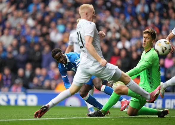 Djeidi Gassama of Rangers scores past Viktoria Plzen goalkeeper Florian Wiegele to give Rangers a 1-0 lead. Rangers v Viktoria Plzen, UEFA Champions League, 3rd Qualifying Round, First Leg, Football, Ibrox Stadium, Glasgow, Scotland, UK - 05 Aug 2025Glasgow Ibrox Stadium Scotland United Kingdom EDITORIAL USE ONLY No use with unauthorised audio, video, data, fixture lists, club league logos or live services. Online in-match use limited to 120 images, no video emulation. No use in betting, games or single club league player publications. Copyright: xStuartxWallace Shutterstockx 15428174h