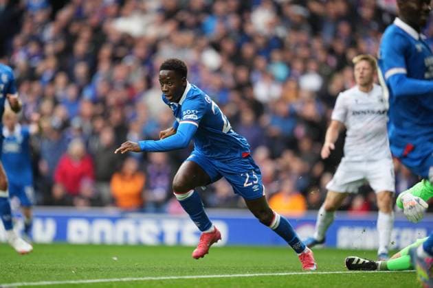 Djeidi Gassama of Rangers runs away from goal in celebration after scoring to give Rangers a 1-0 lead. Rangers v Viktoria Plzen, UEFA Champions League, 3rd Qualifying Round, First Leg, Football, Ibrox Stadium, Glasgow, Scotland, UK - 05 Aug 2025Glasgow Ibrox Stadium Scotland United Kingdom EDITORIAL USE ONLY No use with unauthorised audio, video, data, fixture lists, club league logos or live services. Online in-match use limited to 120 images, no video emulation. No use in betting, games or single club league player publications. Copyright: xStuartxWallace Shutterstockx 15428174i
