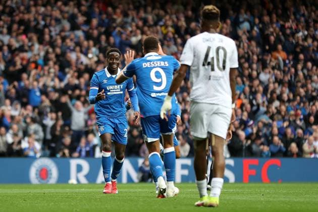 Djeidi Gassama of Rangers celebrates his goal with his team mate Cyriel Dessers during the Champions League third qualifying round first leg match at Ibrox Stadium, Glasgow. Rangers v Viktoria Plzen - UEFA Champions League - Third Qualifying Round First Leg - Ibrox Stadium, Glasgow, Lanarkshire, Scotland, UK - 05 Aug 2025Glasgow Ibrox Lanarkshire United Kingdom  Copyright: xO Rourke RangersxFC Shutterstockx 15428761ai