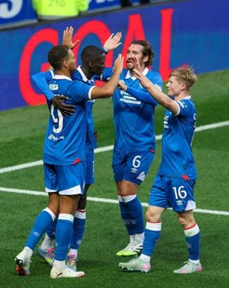 Cyriel Dessers of Rangers celebrates scoring his sides second goal during UEFA Champions League second qualifying round first leg at Ibrox Stadium, Glasgow. Rangers v Viktoria Plzen, UEFA Champions League, 3rd Qualifying Round, First Leg, Football, Ibrox Stadium, Glasgow, Scotland, UK - 05 Aug 2025Glasgow Ibrox Stadium Scotland United Kingdom EDITORIAL USE ONLY No use with unauthorised audio, video, data, fixture lists, club league logos or live services. Online in-match use limited to 120 images, no video emulation. No use in betting, games or single club league player publications. Copyright: xRangersxFC Shutterstockx 15428772an