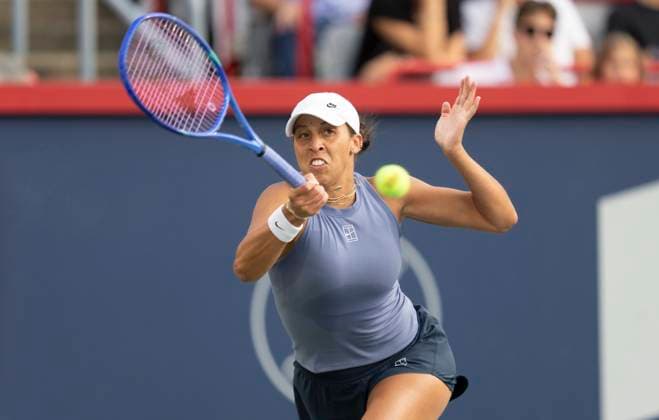 August 5, 2025, Montreal, Pq, Canada: Madison Keys of the United States hits a return to Clara Tauson of Denmark during quarterfinal tennis action at the National Bank Open in Montreal, Tuesday, Aug. 5, 2025. Canada News - August 5, 2025  - ZUMAc35_ 20250805_zaf_c35_049 Copyright: xChristinnexMuschix