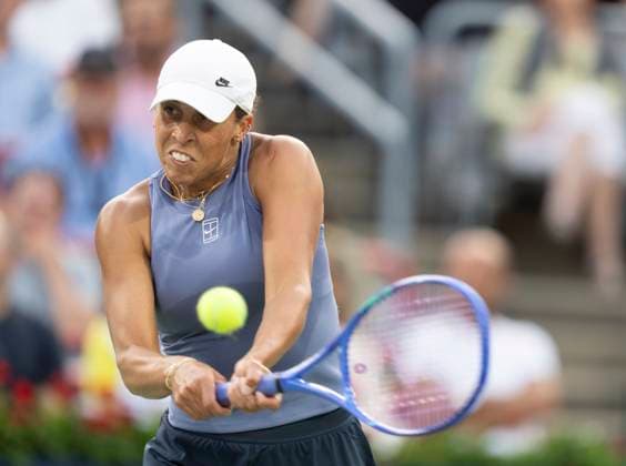 August 5, 2025, Montreal, Pq, Canada: Madison Keys of the United States hits a return to Clara Tauson of Denmark during quarterfinal tennis action at the National Bank Open in Montreal, Tuesday, Aug. 5, 2025. Canada News - August 5, 2025  - ZUMAc35_ 20250805_zaf_c35_064 Copyright: xChristinnexMuschix