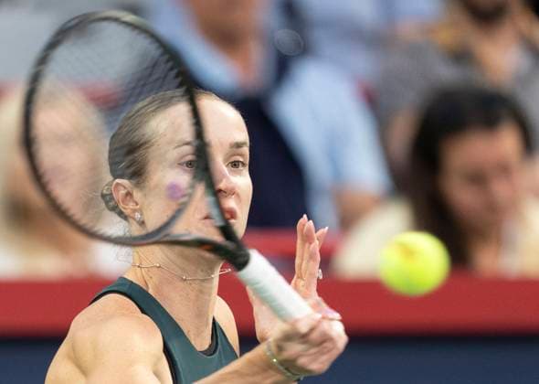 August 5, 2025, Montreal, Pq, Canada: Elina Svitolina of Ukraine hits a return to Naomi Osaka of Japan during quarterfinal tennis action at the National Bank Open in Montreal, Tuesday, Aug. 5, 2025. Canada News - August 5, 2025  - ZUMAc35_ 20250805_zaf_c35_078 Copyright: xChristinnexMuschix