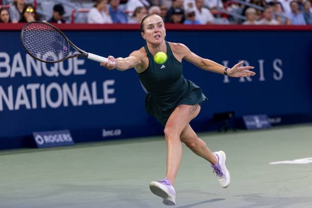 August 5, 2025, Montreal, Quebec, Canada: ELINA SVITOLINA (10) from Ukraine forehand in first set against Naomi Osaka from Japan in quarter final at Canadian Open at IGA stadium in Montreal, Quebec, Canada on 2025-08-05 Montreal Canada - ZUMAl189 20250805_zsp_l189_021 Copyright: xYannickxLegarex