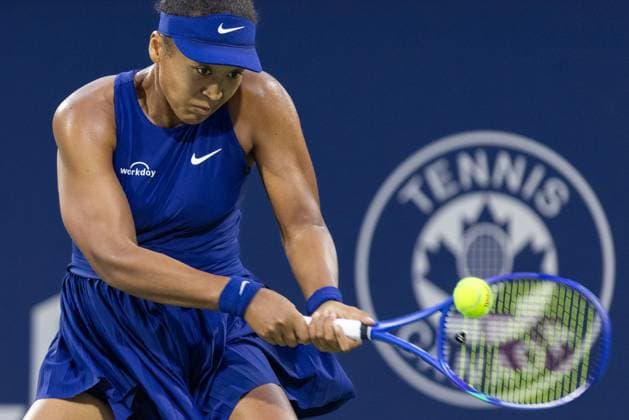 August 5, 2025, Montreal, Quebec, Canada: NAOMI OSAKA from Japan back hand in first set against Elina Svitolina (10) from Ukraine in quarter final at Canadian Open at IGA stadium in Montreal, Quebec, Canada on 2025-08-05 Montreal Canada - ZUMAl189 20250805_zsp_l189_030 Copyright: xYannickxLegarex