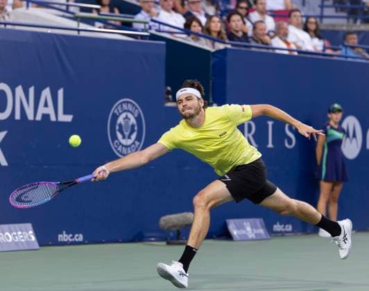 (250806) -- TORONTO, Aug. 6, 2025 -- Taylor Fritz of the United States returns the ball during the men s singles quarterfinal match between Andrey Rublev of Russia and Taylor Fritz of the United States at the 2025 National Bank Open tennis tournament in Toronto, Canada, on Aug. 5, 2025. (Photo by Xinhua) (SP)CANADA-TORONTO-TENNIS-NATIONAL BANK OPEN-MEN S SINGLES-QUARTERFINALS ZouxZheng 