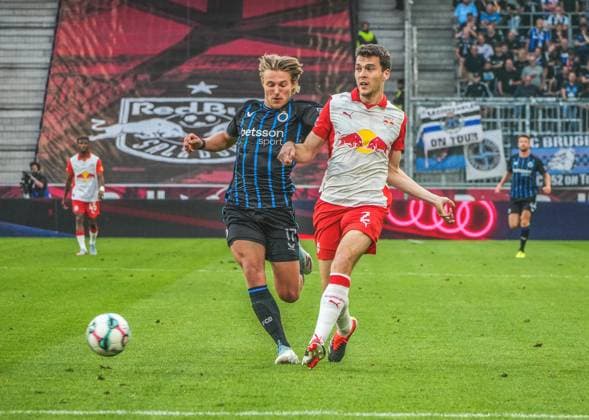 Football Austria, UEFA Champions League 2025 2026, 3rd qualifying round Red Bull Salzburg vs Club Brugge Red Bull Arena Salzburg, Wals Siezenheim, Austria Jacob Vandsa Ryfeldt Rasmussen Red Bull Salzburg with Romeo Vermant Club Brugge KV Copyright: xLukasxBierederx