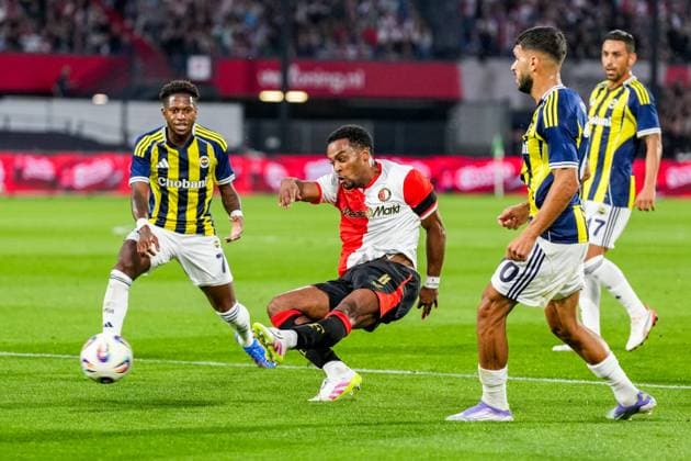 UEFA Champions League: Feyenoord v Fenerbahce SK Rotterdam - Fred of Fenerbache SV, Quinten Timber of Feyenoord and Oguz Aydin of Fenerbache SK during the third qualification round 1st leg of The Champions League 2025 2026. The match is set between Feyenoord and Fenerbahce SK at Stadion Feijenoord De Kuip on 6 August 2025 in Rotterdam, The Netherlands. Copyright: xYannickxVerhoevenx