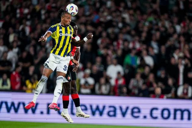 2025-08-06 Feyenoord v Fenerbahce SK - UEFA Champions League Third Qualifying Round ROTTERDAM, NETHERLANDS - AUGUST 6: Archie Brown of Fenerbahce SK, Jordan Lotomba of Feyenoord battle for the ball during the UEFA Champions League Third Qualifying Round match between Feyenoord and Fenerbahce SK at Stadion Feijenoord on August 6, 2025 in Rotterdam, Netherlands. Rotterdam Stadion Feijenoord Netherlands Content not available for redistribution in The Netherlands directly or indirectly through any third parties. Copyright: xJorisxVerwijstx