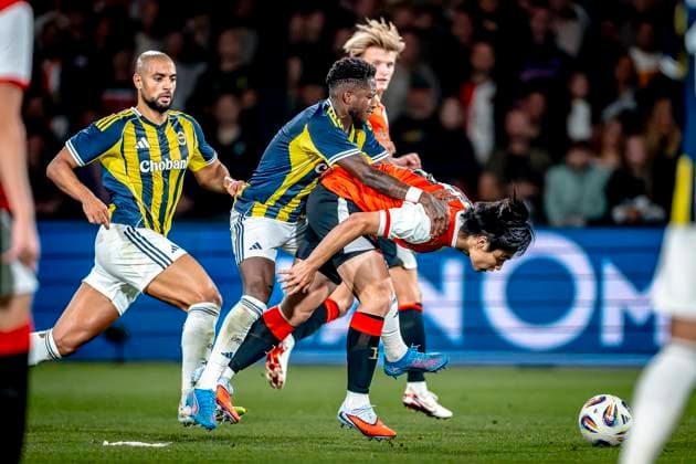 Fenerbahce SK midfielder Fred, Feyenoord Rotterdam forwarder Ayase Ueda during the match Feyenoord Fenerbahce at the Kuip Stadium for the third qualifying round champions league season 2025 2026 in Rotterdam, Netherlands on 6 august 2025, photo by Marcel van Dorst EYE4images DeFodi Images