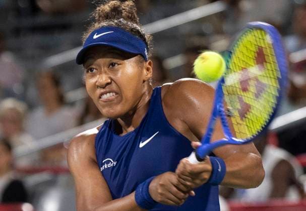 August 6, 2025, Montreal, Pq, Canada: Naomi Osaka of Japan hits a return to Clara Tauson of Denmark during semifinal tennis action at the National Bank Open in Montreal, Wednesday, Aug. 6, 2025. Canada News - August 6, 2025  - ZUMAc35_ 20250806_zaf_c35_097 Copyright: xChristinnexMuschix
