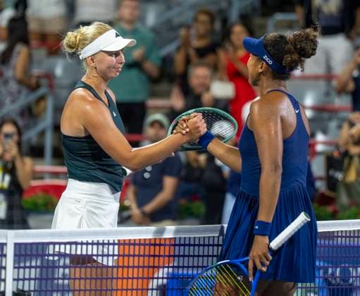 August 6, 2025, Montreal, Pq, Canada: Naomi Osaka of Japan, right is congratulated on her win by Clara Tauson of Denmark during semifinal tennis action at the National Bank Open in Montreal, Wednesday, Aug. 6, 2025. Canada News - August 6, 2025  - ZUMAc35_ 20250806_zaf_c35_096 Copyright: xChristinnexMuschix