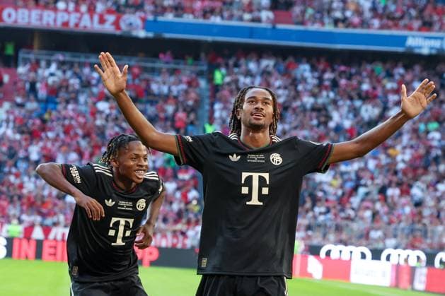 Jonah Kusi Asare 41 FC Bayern Muenchen celebrates his goal for 4 0, with Wisdom Mike 36 FC Bayern Muenchen, FC Bayern Muenchen vs Tottenham Hotspur, DFL, Premier League, Bundesliga, Saison 2025 2026, Vorbereitungsspiel, 07 08 2025 DFB regulations prohibit any use of photographs as image sequences and or quasi video Muenchen Bayern Germany Copyright: xkolbert-press MartinxAgüerax